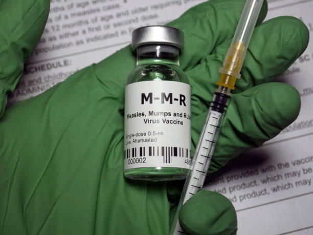 MMR Vaccine abstract Measles, mumps, and rubella vaccine. measles stock pictures, royalty-free photos & images