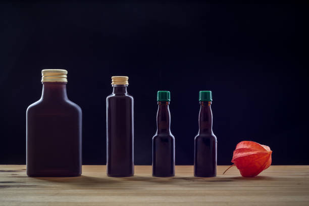 Dark bottles on a dark background