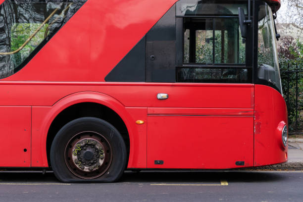istock Deflated Tire on the London Bus 1145644430