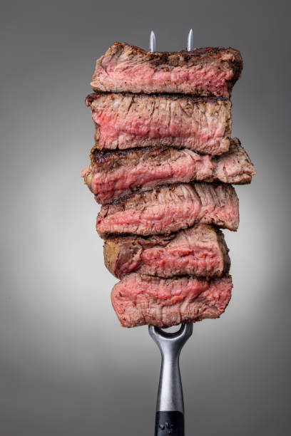 istock slices of a steak on a fork 1145646003