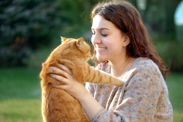istock Woman and Cat ( summer) 1145646167