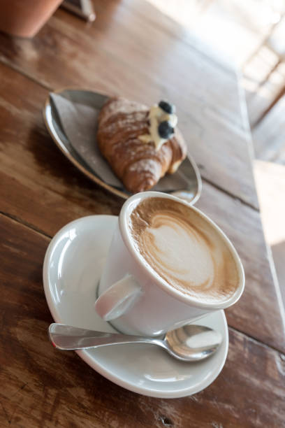 istock Croissant and cappuccino for breakfast 1145648816