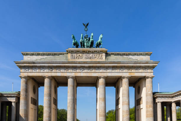 istock Front view of the Brandenburg Gate in Berlin on a sunny day 1145650433