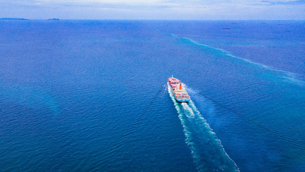 istock Cargo ships with full container receipts to import and export products worldwide 1145653918