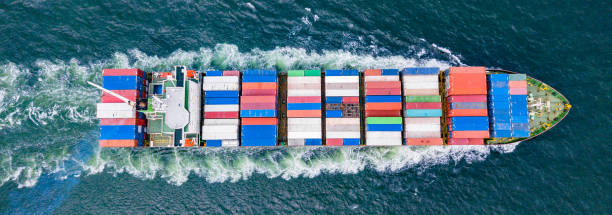 istock Cargo ships with full container receipts to import and export products worldwide 1145653922