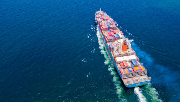 istock Cargo ships with full container receipts to import and export products worldwide 1145653925