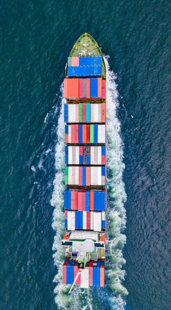 istock Cargo ships with full container receipts to import and export products worldwide 1145653942