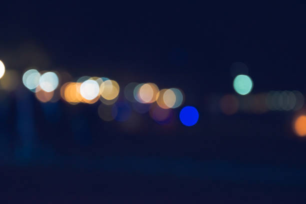 istock Artistic style - abstract background with bokeh defocused lights and shadow background for your design. background blurred bokeh. Lights Ceremonies. 1145654405
