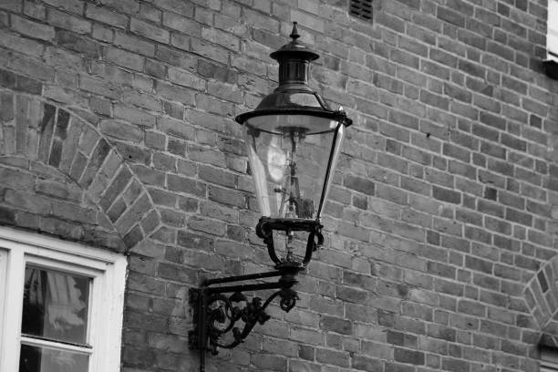 old lamp at a hous wall