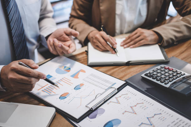 istock Business team colleague working with new startup project plan and discussion information for financial strategy with laptop, results of their successful teamwork 1145655941