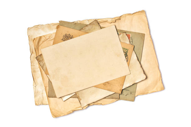 istock Mock up of empty old vintage yellowed paper sheets and card 1145656105