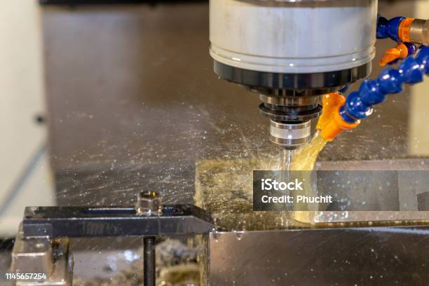 The Cnc Milling Machine Cutting The Mould Parts With Indexable Tool Stock Photo - Download Image Now