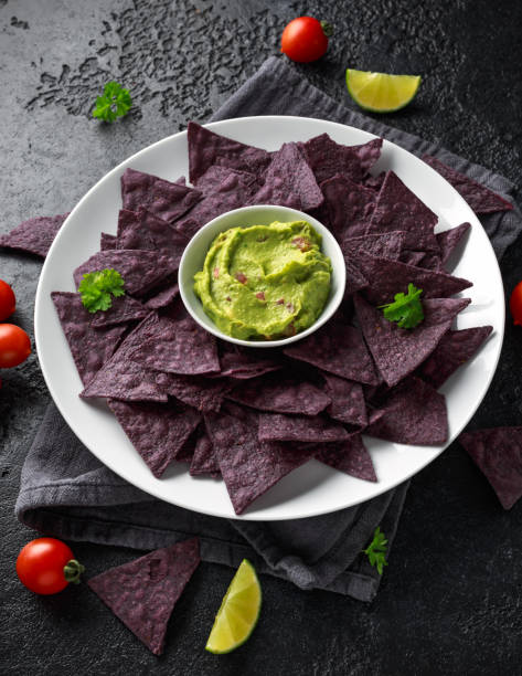 istock Blue corn Organic tortilla chips with Guacamole 1145658330