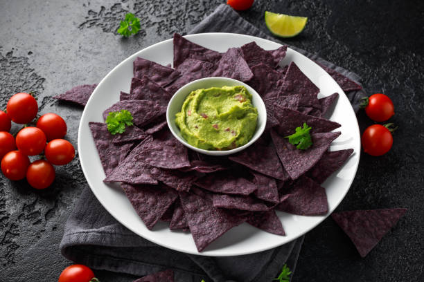 istock Blue corn Organic tortilla chips with Guacamole 1145658339