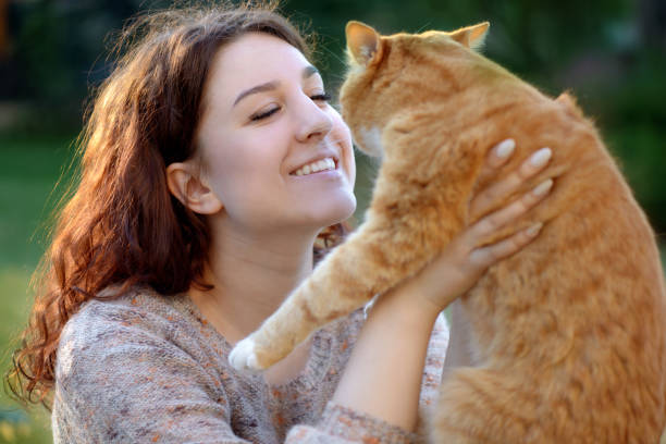 istock Woman and Cat ( summer) 1145660595
