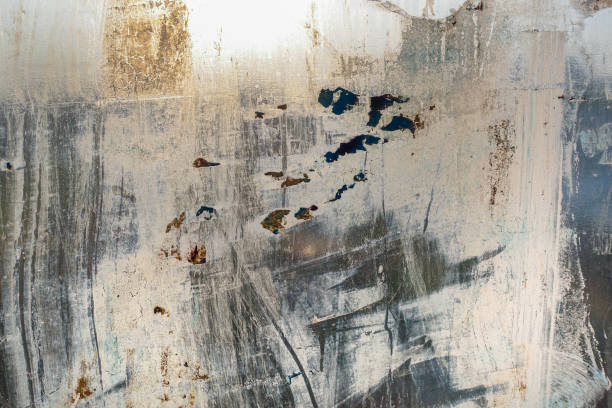 istock Abstract background. Window chaotically smeared with paint, illuminated by the sun. 1145661593
