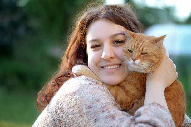 istock Woman and Cat ( summer) 1145661918
