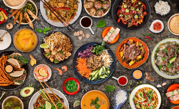 istock Asian food background with various ingredients on rustic stone background , top view. 1145662335