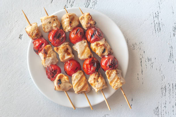 istock Grilled chicken skewers on the white plate 1145663381