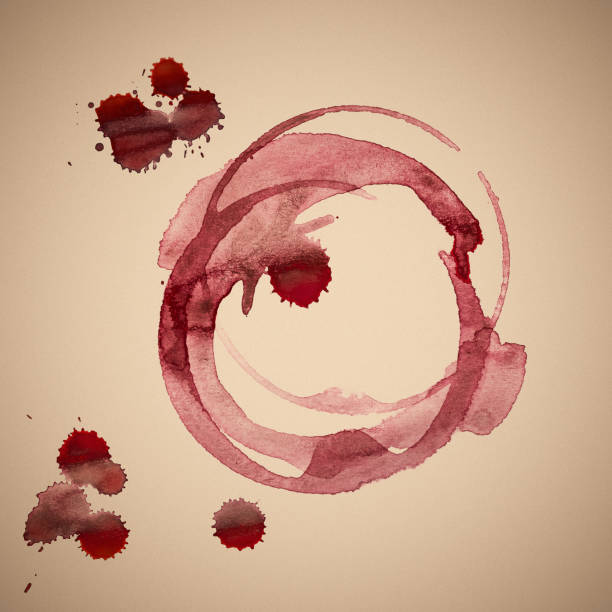 istock Red wineglass stains on sepia background 1145665362