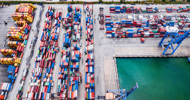 istock Deep water port with cargo ship and container  import and export products worldwide 1145666129