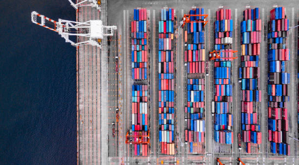 istock Deep water port with cargo ship and container  import and export products worldwide 1145666130
