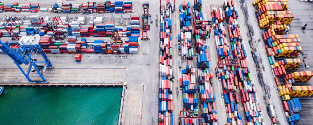 istock Deep water port with cargo ship and container  import and export products worldwide 1145666659