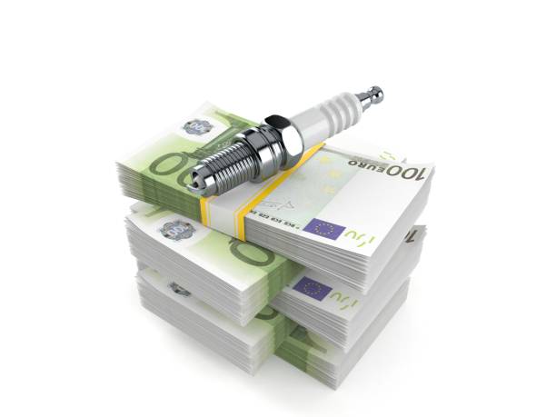 istock Car candle on stack of money 1145668793