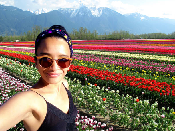 istock Selfie Woman Tulip 1145669994