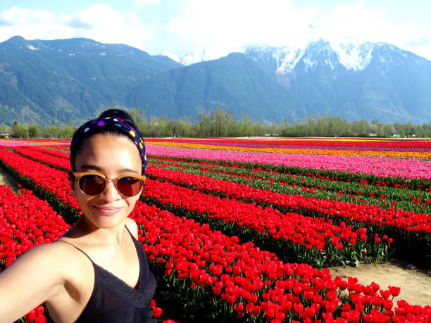 istock Selfie Woman Tulip 1145670023