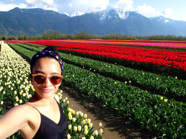istock Selfie Woman Tulip 1145670047