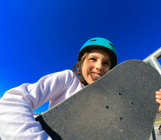 istock Little skateboarder portrait using a mouth guard 1145670745