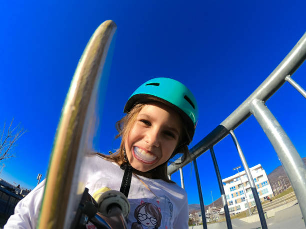 Little skateboarder portrait using a mouth guard