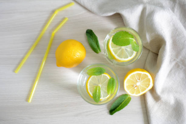 istock Cold refreshing lemonade with fresh mint and lemon in a glass Summer drink 1145671526