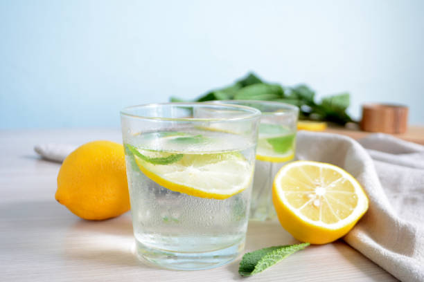 istock Cold refreshing lemonade with fresh mint and lemon in a glass Summer drink 1145672314