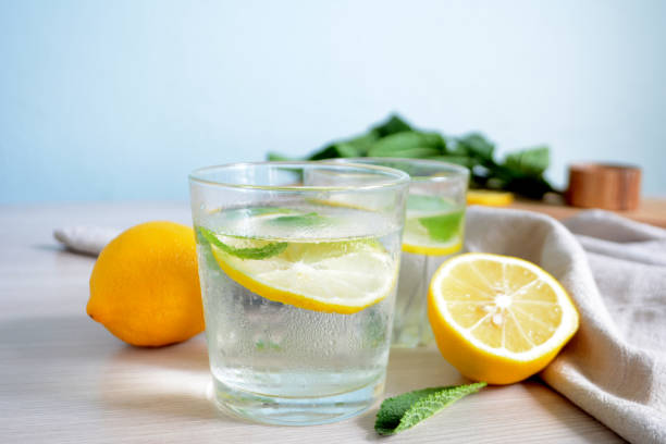 istock Cold refreshing lemonade with fresh mint and lemon in a glass Summer drink 1145672778