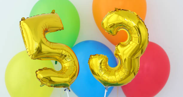 istock Gold foil number 53 celebration balloon on a color 1145674437