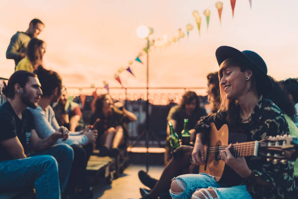 istock Friends drinking and partying on the rooftop 1145683815
