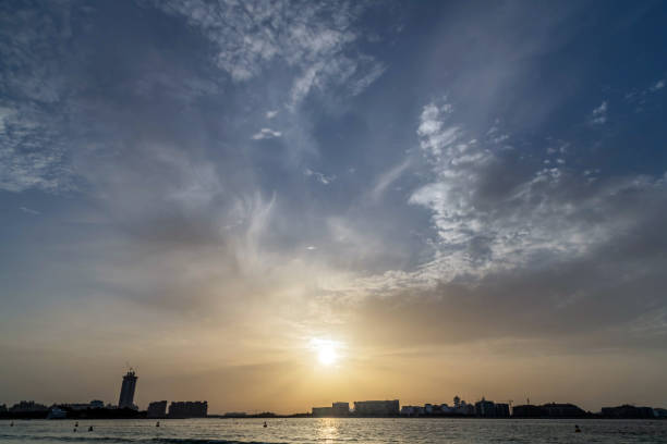 dramatic evening cloudy sky and sunset view over Dubai, United Arab Emirates