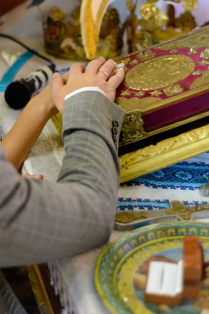 https://media.istockphoto.com/id/1145687630/photo/wedding-gold-rings-standing-on-a-plate-in-the-church.jpg?b=1&s=170667a&w=0&k=20&c=PRE3JNmW1ygxotp4oEkwUR4K5vGmOU1MZJxRz6nDxrE=