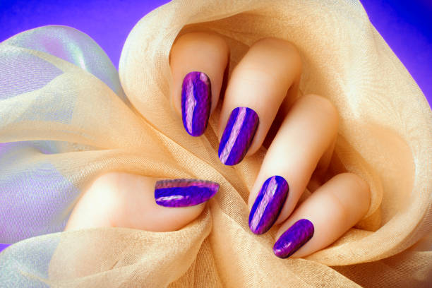 istock purple textured nails manicure 1145689845