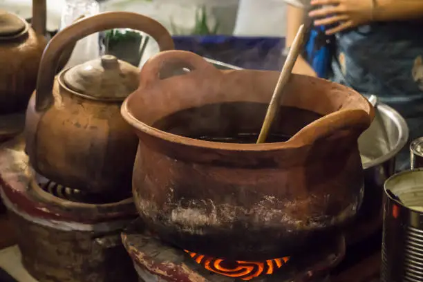 Vintage Clay Pot making Thai Curry in street market