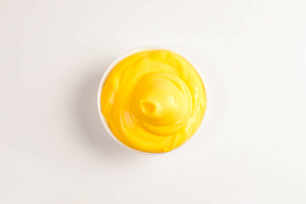 istock Cheese sauce in white plate on white background. 1145691367