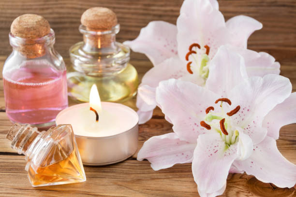 istock Body Care Oil and Lilies 1145691423