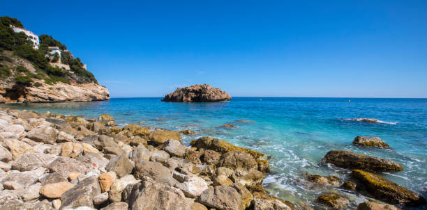istock Ambolo Beach, also known as Playa Ambolo, in Javea, Spain 1145692632