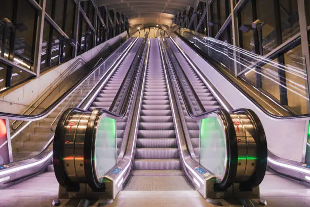 Photo of Modern Escalator Point of View from Bottom