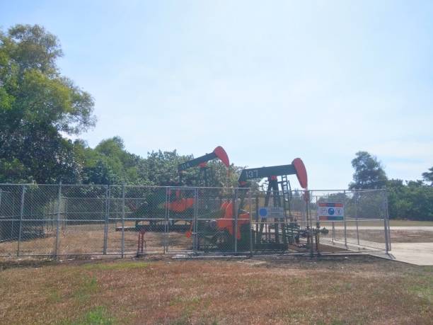 istock oil field pump onshore production well 1145699489