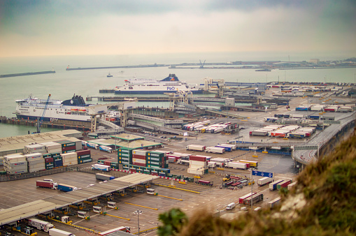 Port of dover in England with white water on the shore