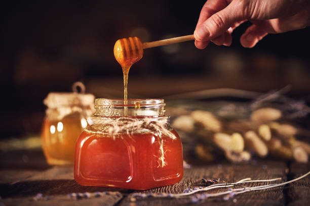 istock Organic honey products on wooden table 1145703471