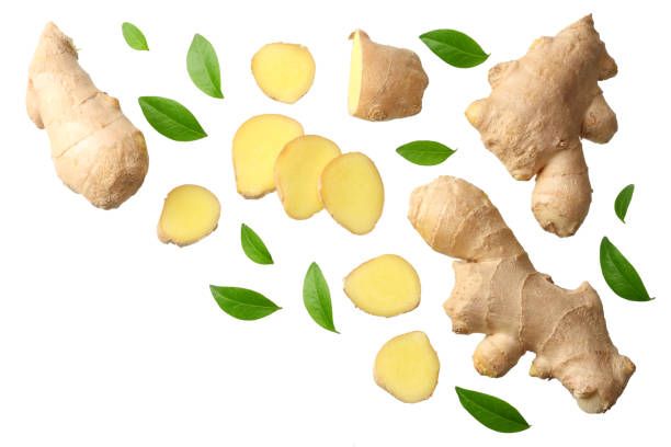 istock sliced ginger with leaves isolated on white background top view 1145703847